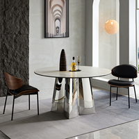 Produit Vente en gros de meubles de salle à manger de luxe légers meilleure qualité 130 150cm Table à manger ronde en céramique chromée blanche et 4 chaises