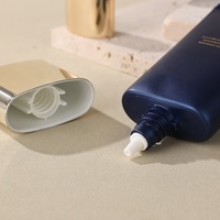 Recién llegado, gran venta, tubo suave cosmético, tubo de PE de forma plana para crema para el cuidado de la piel y protector solar con tapón de rosca plateado y dorado