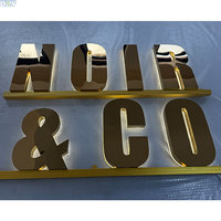 Lettres en acier inoxydable doré poli rétroéclairées avec canal pour enseignes LED haut de gamme pour entreprises de signalétique commerciale