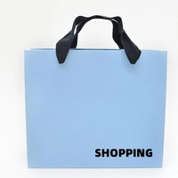 Vente en gros de sacs à provisions de luxe en papier avec logo de marque propre personnalisés pour la protection de l'environnement