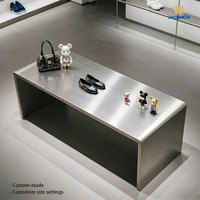 Table de présentation à plusieurs niveaux en acier inoxydable de luxe pour vêtements, chaussures, sacs, magasin de détail