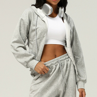 Nouvelle veste zippée de sport automne-hiver pour femme, cardigan à capuche, sweat-shirt ample avec poches, idéal pour le yoga