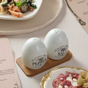 Funky decorativo forma di uovo piccolo custom made <span class=keywords><strong>in</strong></span> <span class=keywords><strong>ceramica</strong></span> compagnia aerea di sale e pepe shaker - Product Image 2