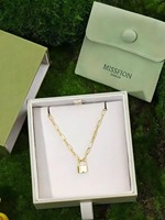 Boîte à bijoux de type tiroir vert terre avec pochette assortie pour l'emballage de bijoux fins