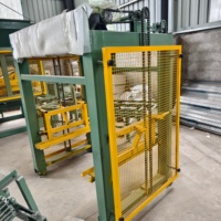 Machine automatique de superposition de blocs pour ligne de production de blocs de béton