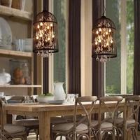 Lustre moderne en fer noir avec cage à oiseaux et cristaux transparents, design rustique américain pour restaurant et salon