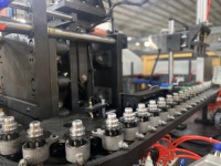 NOUVEAU Machine de fabrication de bouteilles en PET entièrement automatique 2.5L 5L Machine de fabrication de bouteilles Machine de soufflage d'eau