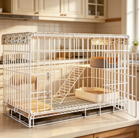 Cage à chat moderne en fer pour usage domestique avec grande porte latérale, plateforme à 2 niveaux, échelle et deux plateaux en plastique extractibles pour chats domestiques