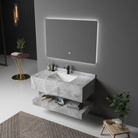 Meuble-lavabo de salle de bain moderne de luxe mural en pierre artificielle avec miroir et lavabo en céramique
