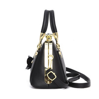 Sacs à main pour femmes en cuir PU brillant de haute qualité 2024, sacs à bandoulière avec pendentif fleur, vente en gros