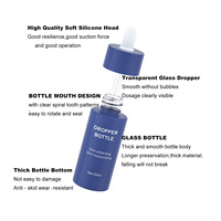Flacon compte-gouttes en verre à bouton pression d'essence bleue de 30 ml 1oz emballage en verre flacon compte-gouttes pour presse à huile oculaire