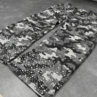 Pantalon streetwear personnalisé 100% coton, hiver, imprimé camouflage, strass, design troué, style hip-hop pour hommes