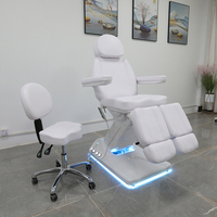 Chaise de tatoueur moderne haut de gamme lit de spa électrique réglable pour le visage table de massage de salon de beauté avec lampe à led