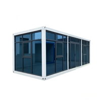 Maison conteneur modulaire intégrée en verre avec panneaux sandwich durables pour espace de travail et appartement - Transparence et installation rapide