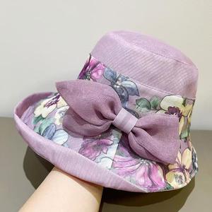 หมวกทรงบักเก็ตประดับโบว์ลายดอกไม้สำหรับผู้หญิง หมวกปีกกว้างกันแดดสไตล์เกาหลี พับเก็บได้ ทำจากผ้าฝ้ายและผ้าลินิน - Product Image 4