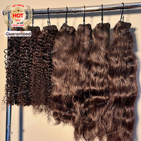 Vendeurs de cheveux vierges Paquets de cheveux humains bruts vietnamiens Paquet de cheveux humains naturels bruns ondulés Extension de cheveux humains en gros OEM ODM