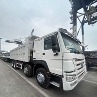 Prix d'usine SINOTRUK HOWO NX 8x4 Camion benne d'occasion 12 roues pour l'Afrique pour le transport de sable et de gravier