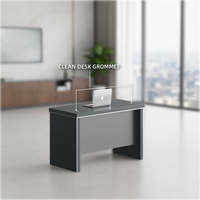 Table de bureau avec une surface de travail spacieuse et deux passe-câbles pour le bureau et les réunions