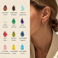 Pendientes de moda 2026: Aros de moda chapados en oro de 18K con dije de rubí y circonitas cúbicas colgantes para niñas al por mayor