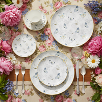 Service de table de luxe en or véritable, motif papillon bleu, en porcelaine fine, assiette de présentation florale en céramique, tasse à café et bol en porcelaine pour mariage