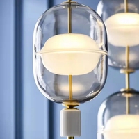 Luminaire suspendu en verre de style nordique créatif pour café, restaurant, hall d'accueil, salle d'exposition, escalier, lustre pour plafond haut