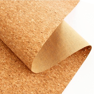 Roll of premium-grade cork PU leather fabric showing natural bread-vein texture