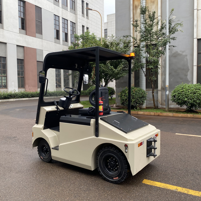 3T 4T Electric Tow Tractor with Cab Lithium-Ion Battery Rough Terrain Industrial Use Seated Operation