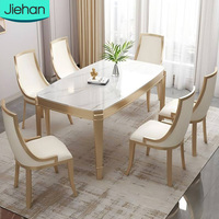 Prix de gros Mobilier pour restaurant et maison Nouveau design Carré personnalisé Blanc et or Ensemble table et chaises de salle à manger modernes en vente