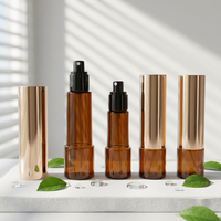 Flacon pulvérisateur transparent marron élancé 70ml/140ml avec capuchon doré électroplaqué intégral