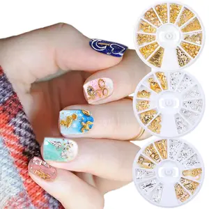 1 tekerlekli altın gümüş 3D tırnak süslemeleri geometrik şık Metal perçin kabuk yıldız üçgen Nail Art alaşım taşlar içi boş çıtçıt