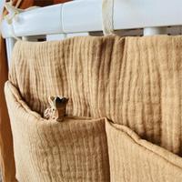 Quantité minimale de commande bas haute qualité mousseline bébé sac de rangement suspendu 100% coton pépinière berceau organisateur jouet couches pochette de rangement