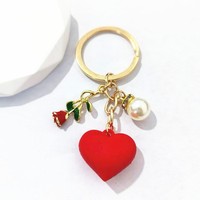 Cadeau romantique pour la Saint-Valentin, élégant porte-clés pendentif macaron pour femme, en alliage métallique durable, rose lumineuse, accessoire de sac