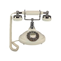 Téléphone rétro filaire en métal avec sonnerie de cloche mécanique et bouton poussoir en résine époxy durable pour le bureau de l'hôtel