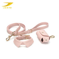 Collier pour animaux de compagnie en PU avec nœud papillon mignon de haute qualité OEM, ensemble laisse 3-en-1 avec distributeur de sacs à déjections et accessoires dorés élégants pour la promenade