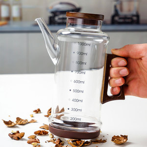 Distributeur d'huile en verre borosilicate avec poignée en bois et échelle graduée, bouteille d'huile en verre résistant à la chaleur pour cuisine, huile et <span class=keywords><strong>vinaigre</strong></span> - Product Image 5