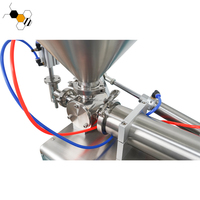 Machine de remplissage liquide de pâte de miel pneumatique semi-automatique de 1000ml à vendre