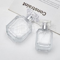 Flacons de parfum en verre transparent de luxe en forme d'hexagone avec pulvérisateur à pompe, impression sérigraphiée et couvercle en acrylique