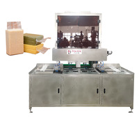 Machine d'emballage sous vide automatique de riz en forme de brique de type brique