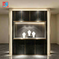 Vitrine à bijoux murale de luxe, unité de présentation arrière en grain de pierre foncée, armoire murale de rangement pleine hauteur