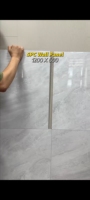 Panneau mural SPC imperméable et ignifuge, vente en gros d'usine, 1220*600mm, rainuré sur tous les côtés, panneau mural de douche en PVC UV imitation marbre