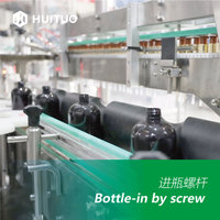 Machine de capsulage de distributeur électrique entièrement automatique pour pompe de bouteille rotative de lotion de corps de shampooing pour le roulement d'emballage de carton en verre