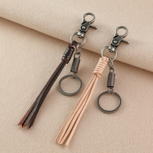 Llavero de cuero genuino estilo euroamericano AM, tejido a mano con borlas de piel de vaca, accesorio de cadena para colgar en la cintura para hombre - Product Image 2