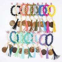 Porte-clés Vintage en bois extensible, diverses séries, disque en bois monogramme, daim, gland, porte-clés, Bracelet élastique