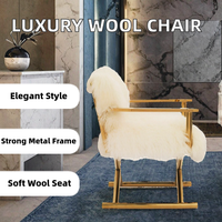 Fauteuil de salon de luxe en laine importée avec finition dorée et structure métallique, design haut de gamme pour usage hôtelier