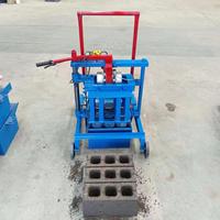 Machine de fabrication de briques creuses autobloquantes à pression hydraulique, populaire au Cameroun, pour la fabrication artisanale de blocs en sable et ciment usagés