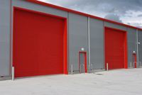 Portes à enroulement en acier galvanisé de style industriel, robustes et résistantes aux ouragans, pour la sécurité avant des bâtiments (vente en gros)