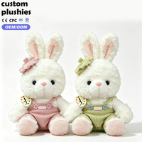 Peluche Lapin Blanc Doux en Gros avec Nœud Rose et Salopette en Velours Côtelé – Cadeau d'Anniversaire pour Fille