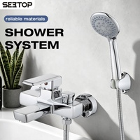 Système de douche mural chromé poli avec mitigeur monocommande, cartouche céramique, jet pluie et douchette à massage doux