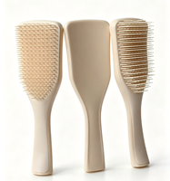 Brosse à cheveux massante en nylon PVC avec logo personnalisé, séchage rapide, usage professionnel en salon, avec coussin intégré