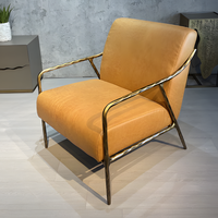 Fauteuil de loisirs individuel en fer forgé massif de style Mid-Century, avec revêtement en cuir ciré rétro et structure en métal forgé à la main